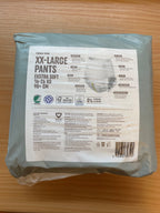 Bagside af REMA 1000 XXL Pants 7 med 16–26 kg, 98+ cm, materialer, mærkninger og EAN 5705830358592.