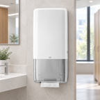Hvid Tork H5 PeakServe 552500 standarddispenser på lyst kontortoilet