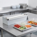 Dispenser til film og folie på cateringbord, stemningsbillede