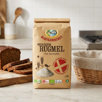 Kornkammeret økologisk rugmel ved skåret rugbrød og brødkurv i køkkenet