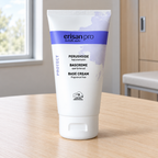 Erisan Pro Base Cream i lukket tube på bord i personalefaciliteter