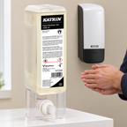 Katrin 101030 gelrefill ved illustreret håndindgnidning og hvid manuel Katrin-dispenser