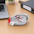 Pritt Compact Flex-rettetape ved bærbar computer og mappe, genereret miljøbillede