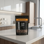 Café Noir Medium 240 g instant kaffe på bord i kontorkøkken