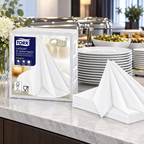 Tork LinStyle-servietter ved buffet med tallerkener